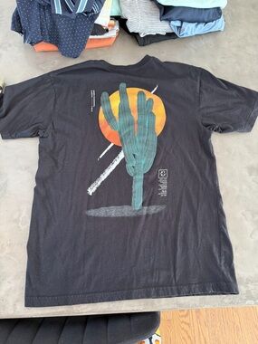 Source Unknown Black Tee with Teal Cactus and Orange Sun